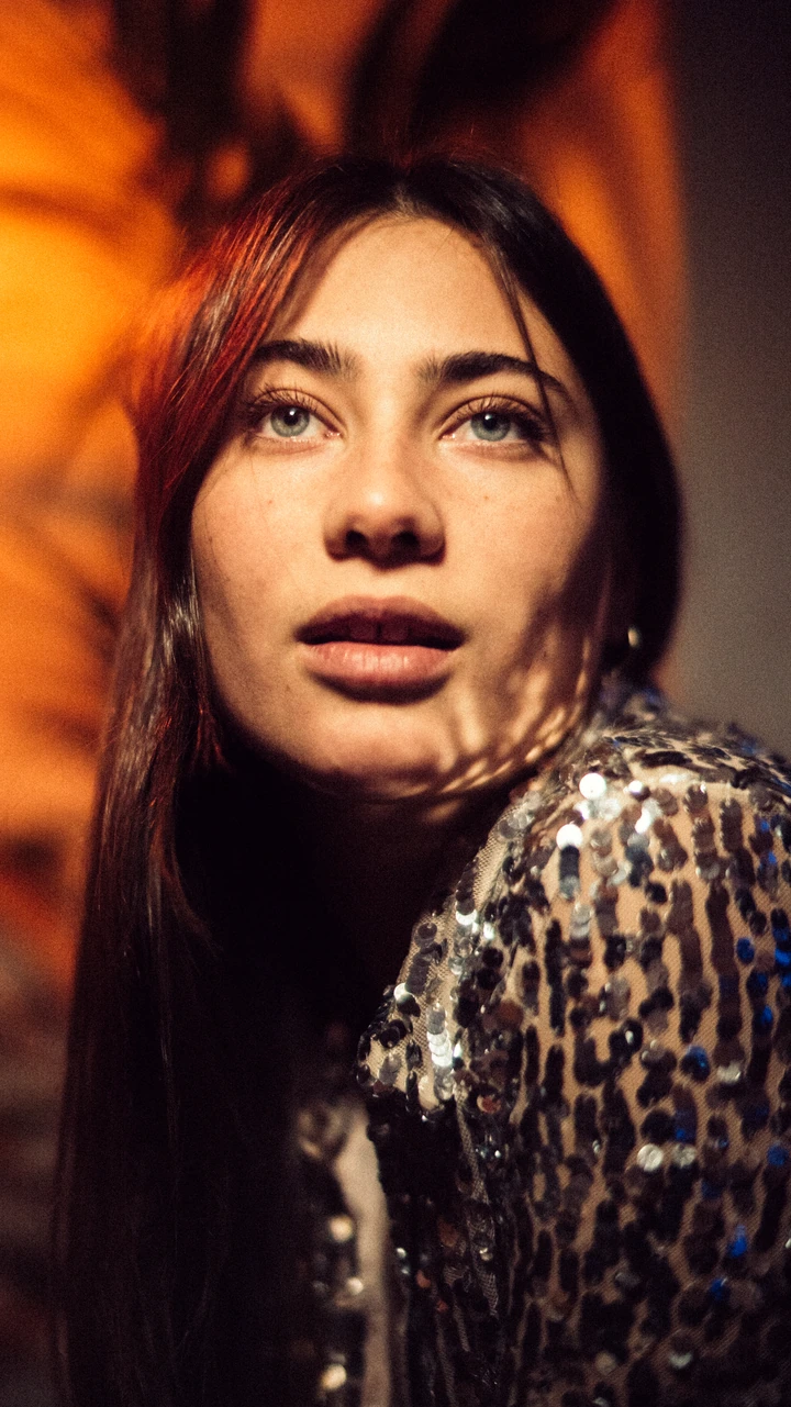 Portrait in warm amber light