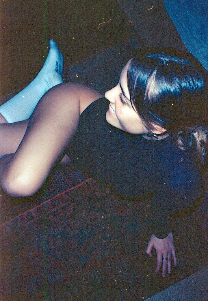 Reclining portrait in cool subdued light