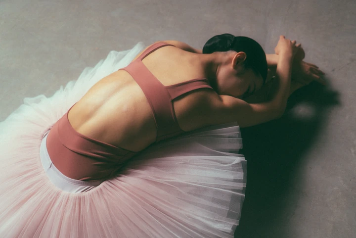 Close study of a dancer leaning backwards